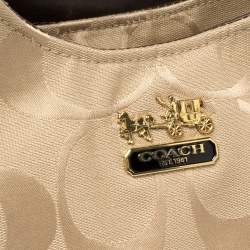 Pre Owned Coach Beige/Brown Signature Canvas and Leather Madison Maggie Hobo