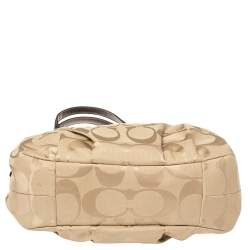 Pre Owned Coach Beige/Brown Signature Canvas and Leather Madison Maggie Hobo