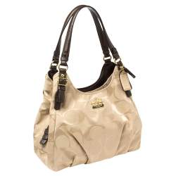 Pre Owned Coach Beige/Brown Signature Canvas and Leather Madison Maggie Hobo
