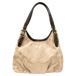 Pre Owned Coach Beige/Brown Signature Canvas and Leather Madison Maggie Hobo