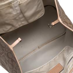Pre Owned Coach Beige/Brown Signature Canvas and Leather City Zip Top Tote