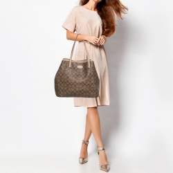 Pre Owned Coach Beige/Brown Signature Canvas and Leather City Zip Top Tote