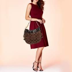 Pre Owned Coach Brown Signature Canvas and Leather Zoe Hobo
