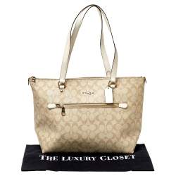 Pre Owned Coach Beige/White Signature Coated Canvas and Leather Gallery Tote