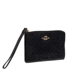 Pre Owned Coach Black Signature Debossed Patent Leather Wristlet Pouch
