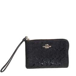 Pre Owned Coach Black Signature Debossed Patent Leather Wristlet Pouch