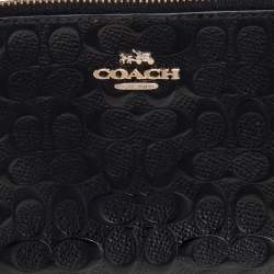 Pre Owned Coach Black Signature Debossed Patent Leather Wristlet Pouch