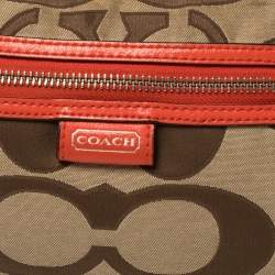 Pre Owned Coach Beige/Orange Signature Canvas and Leather Daisy Hobo