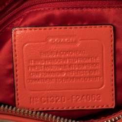 Pre Owned Coach Beige/Orange Signature Canvas and Leather Daisy Hobo