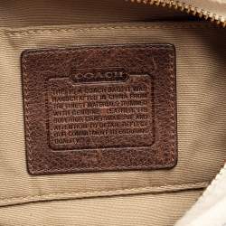 Pre Owned Coach Beige/Brown Signature Canvas and Leather Hobo