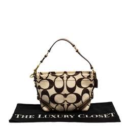 Pre Owned Coach Beige/Brown Signature Canvas and Leather Hobo