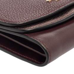 مملوكة مسبقًا Coach Burgundy/Metallic Leather Trifold Wallet