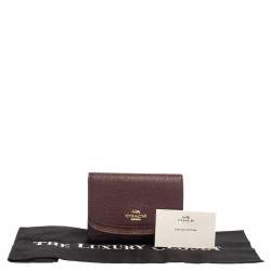 مملوكة مسبقًا Coach Burgundy/Metallic Leather Trifold Wallet