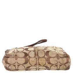 Pre Owned حقيبة كوتش كانفاس بالشعار وجلد بنية بقفل دوار وحمالة معصم 