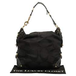 Pre Owned Coach Black Signature Canvas and Leather Carly Hobo