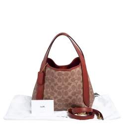Pre Owned Coach Brown/Beige Signature Coated Canvas and Leather Hadley Hobo
