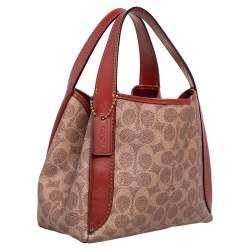 Pre Owned Coach Brown/Beige Signature Coated Canvas and Leather Hadley Hobo