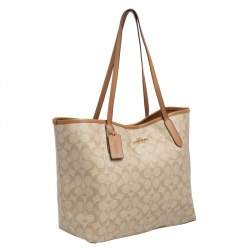 Pre Owned Coach Beige/Brown Signature Canvas and Leather City Tote