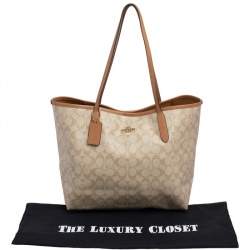 Pre Owned Coach Beige/Brown Signature Canvas and Leather City Tote