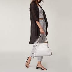 Pre Owned Coach Beige Signature Embossed Leather Edie 31 Shoulder Bag
