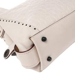Pre Owned Coach Beige Signature Embossed Leather Edie 31 Shoulder Bag
