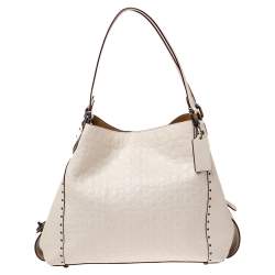 Pre Owned Coach Beige Signature Embossed Leather Edie 31 Shoulder Bag