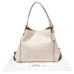 Pre Owned Coach Beige Signature Embossed Leather Edie 31 Shoulder Bag