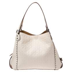 Pre Owned Coach Beige Signature Embossed Leather Edie 31 Shoulder Bag
