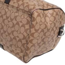 Pre Owned Coach Brown/Beige Signature Coated Canvas and Leather Metropolitan Duffle Bag