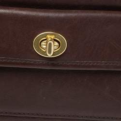مملوكة مسبقًا Coach Dark Brown Leather Turnlock Wristlet Pouch