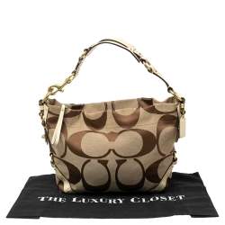 مملوكة مسبقًا حقيبة هوبو كوتش كارلي جلد وكانفاس بيج بالشعار