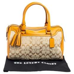 Pre Owned Coach Beige/Mustard Yellow Signature Canvas And Leather Legacy Haley Satchel