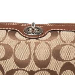 Pre Owned Coach Brown/Beige Signature Canvas and Leather Turnlock Wristlet Pouch
