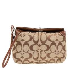 Pre Owned Coach Brown/Beige Signature Canvas and Leather Turnlock Wristlet Pouch