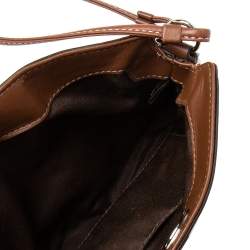 Pre Owned Coach Brown/Beige Signature Canvas and Leather Turnlock Wristlet Pouch