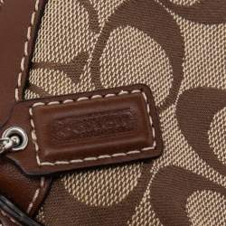 Pre Owned Coach Brown/Beige Signature Canvas and Leather Turnlock Wristlet Pouch