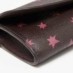 Pre Owned Coach Burgundy Stars Coated Canvas Continental Wristlet Wallet