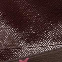 Pre Owned Coach Burgundy Stars Coated Canvas Continental Wristlet Wallet