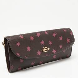 Pre Owned Coach Burgundy Stars Coated Canvas Continental Wristlet Wallet