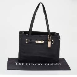 Pre Owned حقيبة يد كوتش سواغر جلد سوداء 