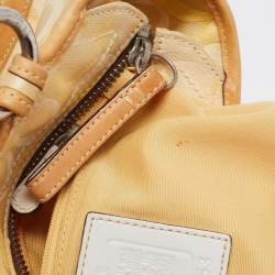 Pre Owned Coach Yellow/White Signature Fabric and Leather Soho Optic Hobo