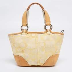 Pre Owned Coach Yellow/White Signature Fabric and Leather Soho Optic Hobo