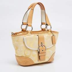 Pre Owned Coach Yellow/White Signature Fabric and Leather Soho Optic Hobo