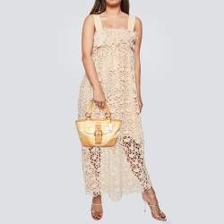 Pre Owned Coach Yellow/White Signature Fabric and Leather Soho Optic Hobo