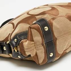 Pre Owned Coach Beige/Dark Brown Signature Canvas and Leather Carly Hobo