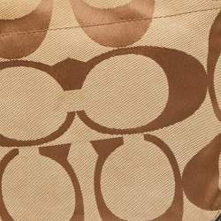 Pre Owned Coach Beige/Dark Brown Signature Canvas and Leather Carly Hobo