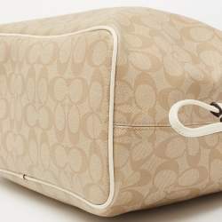 Pre Owned Coach Cream/Beige Signature Coated Canvas and Leather Drawstring Carryall Satchel