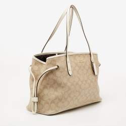 Pre Owned Coach Cream/Beige Signature Coated Canvas and Leather Drawstring Carryall Satchel