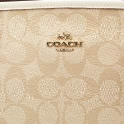 Pre Owned Coach Cream/Beige Signature Coated Canvas and Leather Drawstring Carryall Satchel