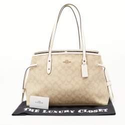 Pre Owned Coach Cream/Beige Signature Coated Canvas and Leather Drawstring Carryall Satchel